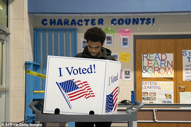 A voter casts his ballot in the Democratic Presidential Primary in West Columbia, South Carolina in February