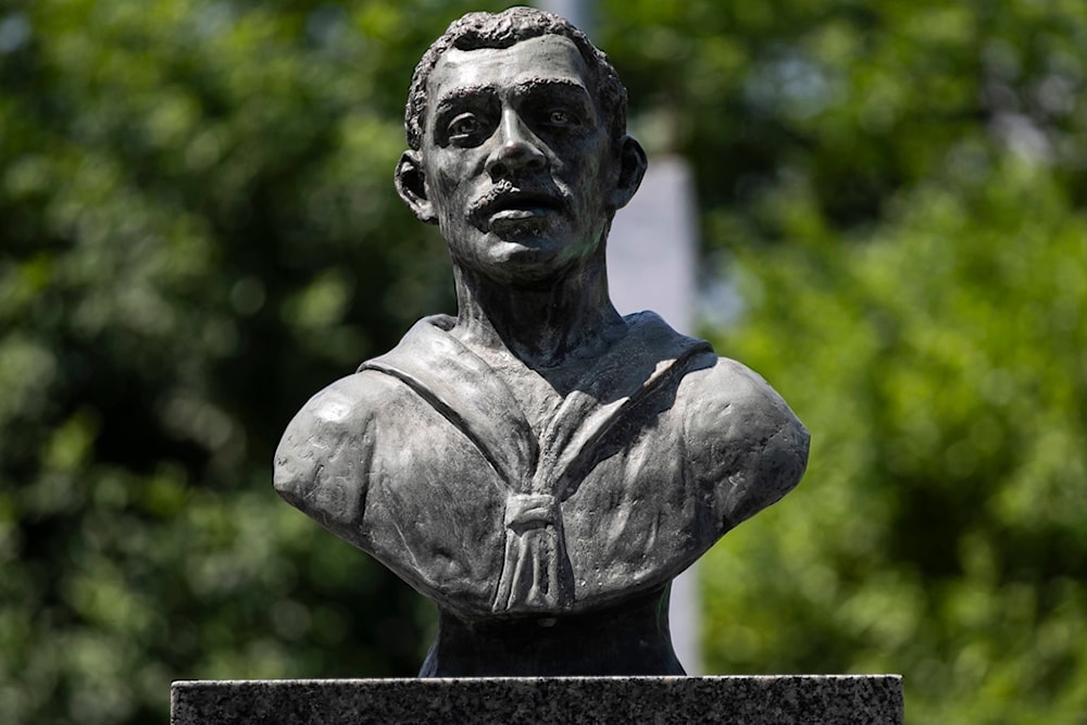 A statue honoring João Cândido, a black sailor who led a revolt against physical punishment of Brazilian navy soldiers in the beginning of the 20th century, in Rio de Janeiro state, Brazil, Thursday, Dec. 21, 2023. (AP)