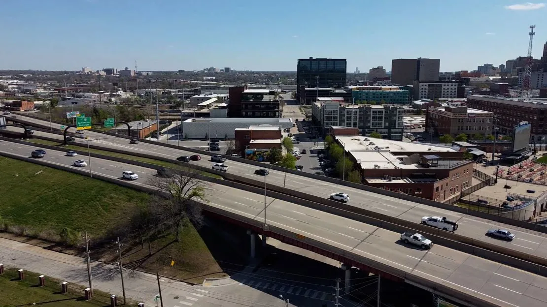 Interstate 244, built as part of the federal highway acts of the 1960s, was constructed right through the heart of the Greenwood neighborhood. The program director for the Greenwood Cultural Center says that was the final blow to the community.