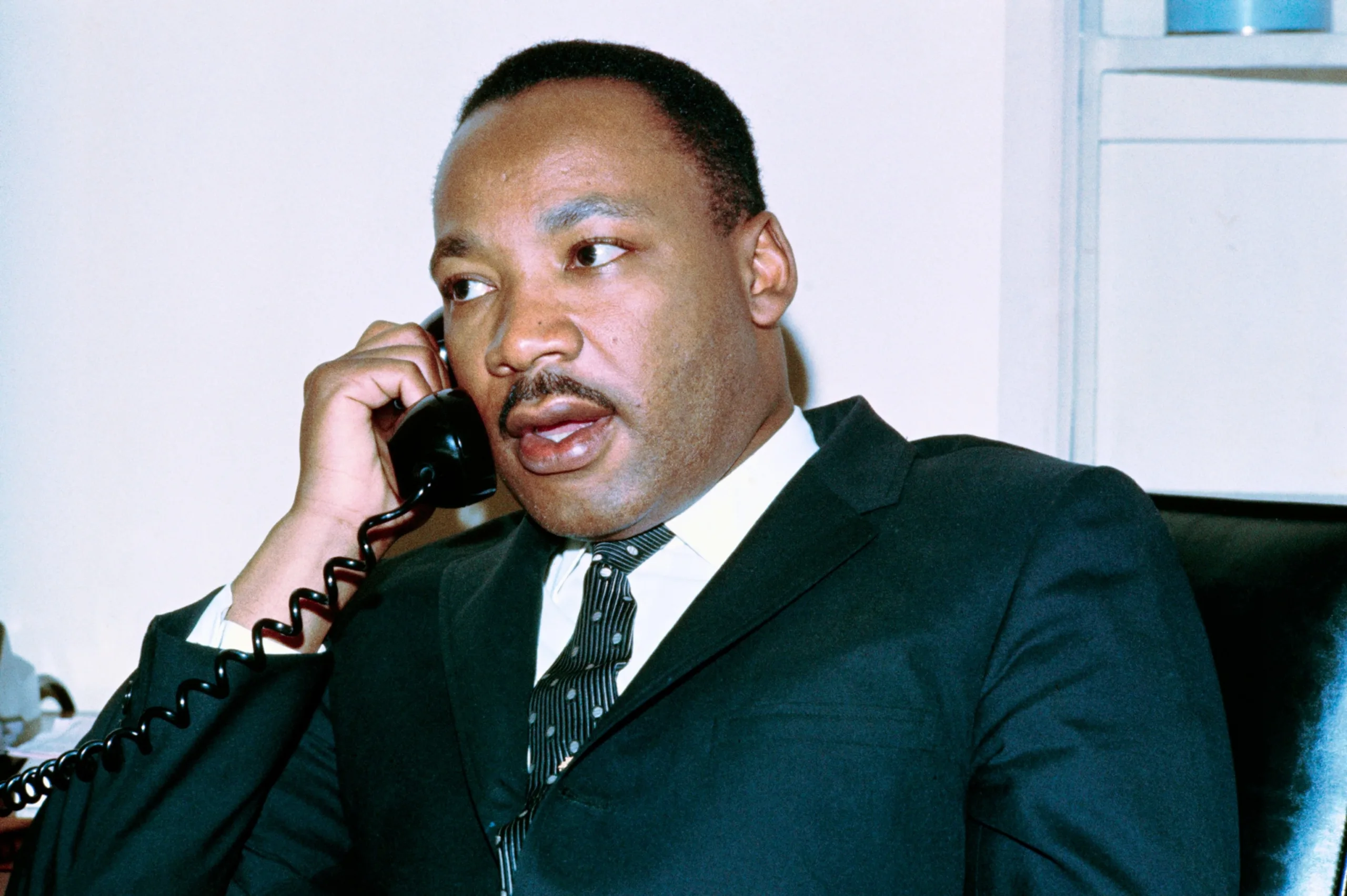 PHOTO: Dr. Martin Luther King Jr., on the phone after delivering a sermon at the Washington Episcopal Cathedral in Washington, D.C.