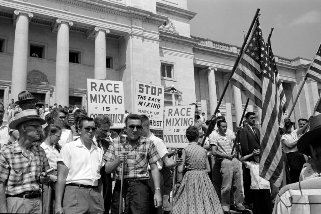 White segregationist demonstrators protesting at the admission of the Little Rock Nine, to Central High School, 1959. The Little Rock Nine were a group of nine African American students enrolled in Little Rock Central High School in 1957. Their enrol