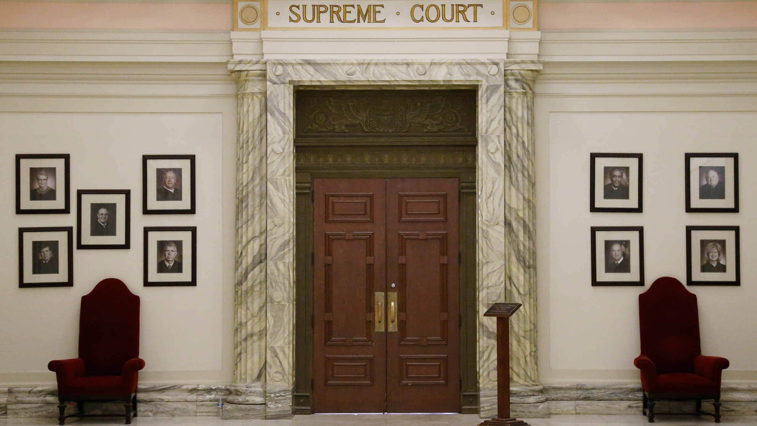 FILE - The Oklahoma Supreme Court is pictured in the state Capitol building in Oklahoma City, May 19, 2014. The Oklahoma Supreme Court on Wednesday, June 12, 2024, dismissed a lawsuit of the last two survivors of the 1921 Tulsa Race Massacre, dampening the hope of advocates for racial justice that the government would make amends for one of the worst single acts of violence against Black people in U.S. history. (AP Photo/Sue Ogrocki, File)