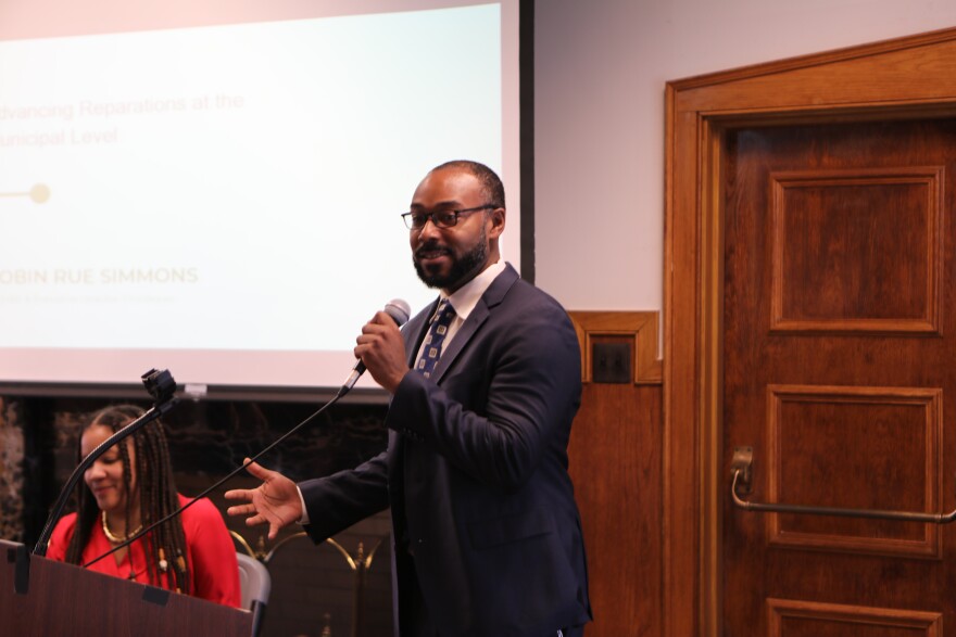 Justin Hansford, co-founder of the African American Redress Network, worked with Robin Rue Simmons (left) and her team in Evanston, Illinois, to get reparations for Black residents in the area. The team created segregation impact studies for Evanston, Illinois, leaders. Evanston is the first city in the nation to repay Black residents for racial discrimination. The city paid out housing grants to some residents through its the Local Reparations Restorative Housing Program.