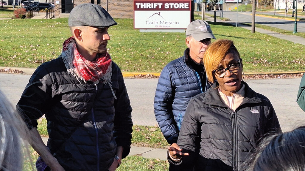 Cyneatha Millsaps and Jason Shenk lead a tour to learn about the harm caused to the African American community through “urban renewal.” — Glenn Gilbert