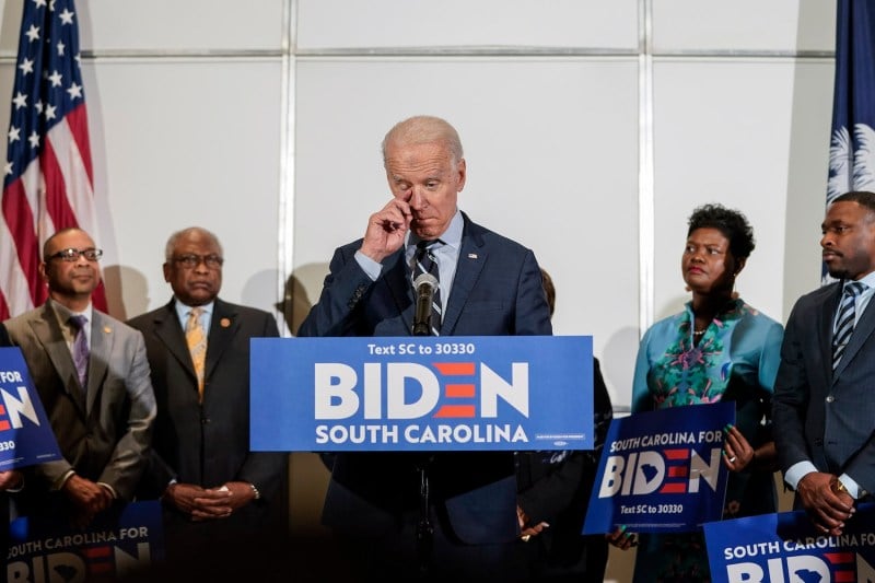 Joe Biden wipes away a tear as he speaks after receiving an endorsement from U.S. Rep. James Clyburn (D-SC) on Feb. 26, 2020 in North Charleston, South Carolina.