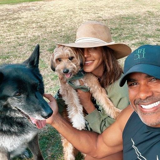 Nicole Ari Parker with husband Boris and their pet dogs