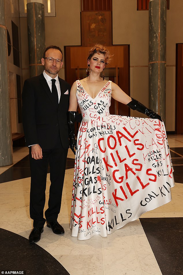 Greens leader Adam Bandt is pictured with his partner Claudia Perkins during the Federal Parliamentary Press Gallery Midwinter Ball in the Great Hall at Parliament House