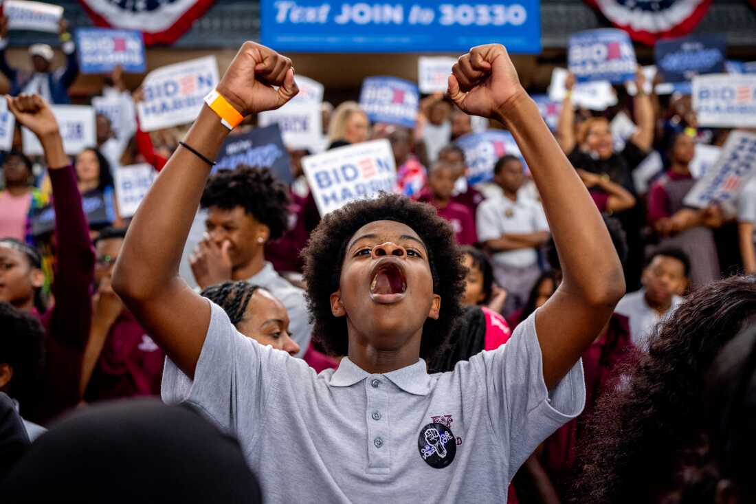 A member of the audience cheers as President Biden speaks during a campaign rally at Girard College on May 29 in Philadelphia. Biden has since dropped out of the race in favor of Vice President Harris and this event launched a nationwide campaign to court black voters, a group that has traditionally come out in favor of Biden, but their support projected lower than it was in 2020.