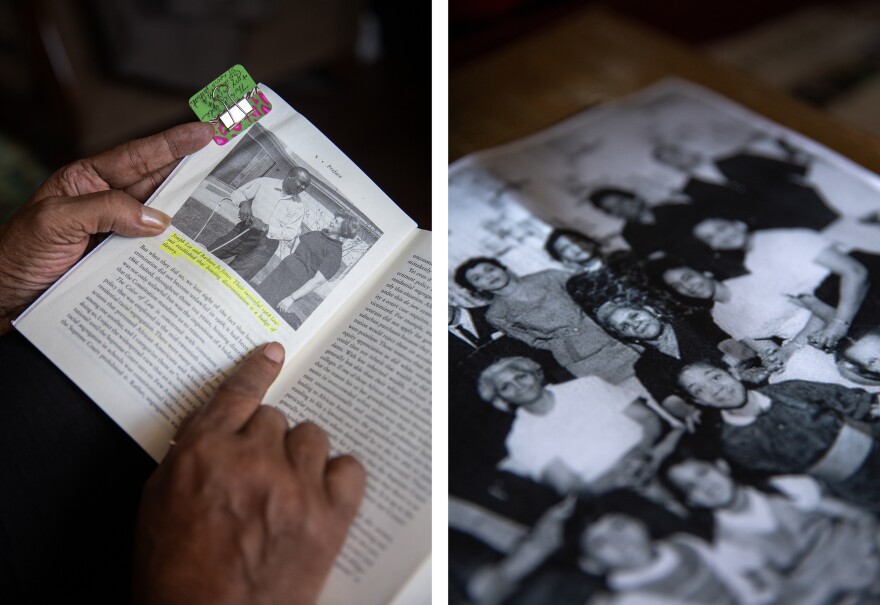 Denise Otey points to a picture of Joseph Lee and Barbara Jo Jones, an interracial couple who won a 1968 housing discrimination lawsuit, on Wednesday, Sept. 27, 2023, at her home in the Northwoods neighborhood of St. Louis. Otey’s great-grandmother Ha’ttie Hand was involved with the group that helped bring the lawsuit. Hand came to St. Louis around 1960 and lived in the Pruitt Igoe housing project.