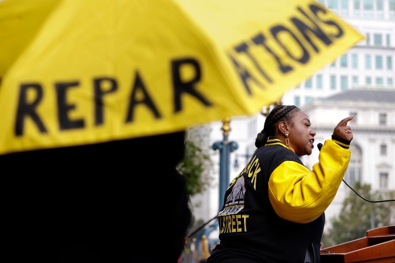 Tinisch Hollins, vice chair of the African American Reparations Advisory Committee, speaks to attendees at a rally in support of reparations in San Francisco in 2023. Photo by Lea Suzuki, San Francisco Chronicle via AP Photo