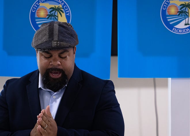 Jesse L. Nelson, pastor of Macedonia Missionary Baptist Church in Panama City, Fla., delivers a prayer prior to the unveiling of small business historical markers Sept. 14, 2024. The markers showcase the legacy of entrepreneurship and community spirit that defines the city’s Glenwood neighborhood. (Tyler Orsburn/News Herald)