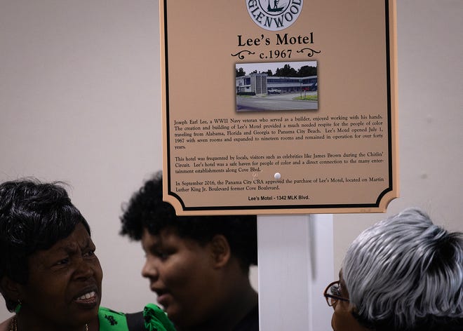 Friends and family gather around Lee’s Motel historical marker at Macedonia Missionary Baptist Church in Panama City, Fla., Sept. 14, 2024. The marker showcases the legacy of entrepreneurship and community spirit that defines the city’s Glenwood neighborhood. (Tyler Orsburn/News Herald)