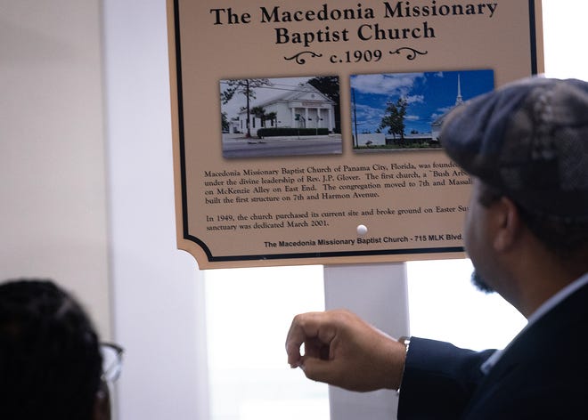 Friends and family gather around Macedonia Missionary Baptist Church’s historical marker at the church in Panama City, Fla., Sept. 14, 2024. The marker showcases the legacy of entrepreneurship and community spirit that defines the city’s Glenwood neighborhood. (Tyler Orsburn/News Herald)