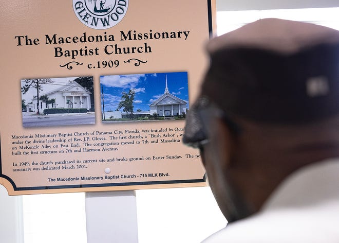 Friends and family gather around Macedonia Missionary Baptist Church’s historical marker at the church in Panama City, Fla., Sept. 14, 2024. The marker showcases the legacy of entrepreneurship and community spirit that defines the city’s Glenwood neighborhood. (Tyler Orsburn/News Herald)