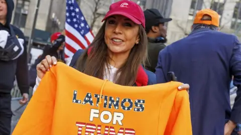 Reuters A Trump supporter outside New York Criminal Court where his hush money trial, in New York, New York, USA, 15 April 2024. 