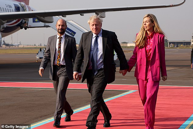 The former PM arriving with his wife Carrie in the Rwandan capital Kigali in June 2022. The King voiced concerns the Rwanda policy would create tension at the Commonwealth Heads of Government Meeting in the city