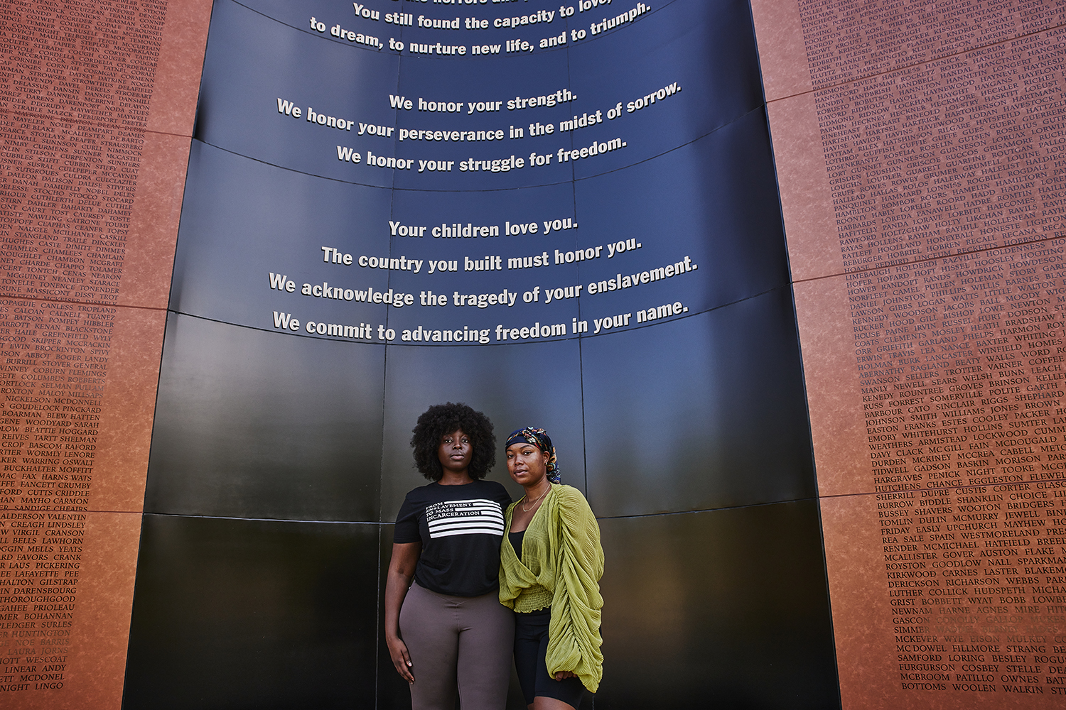 Stanford Law students Ebehi Izokun (left) and Nya Hardaway stand before the National Monument to Freedom at Freedom Monument Sculpture Park in Montgomery, Alabama. 