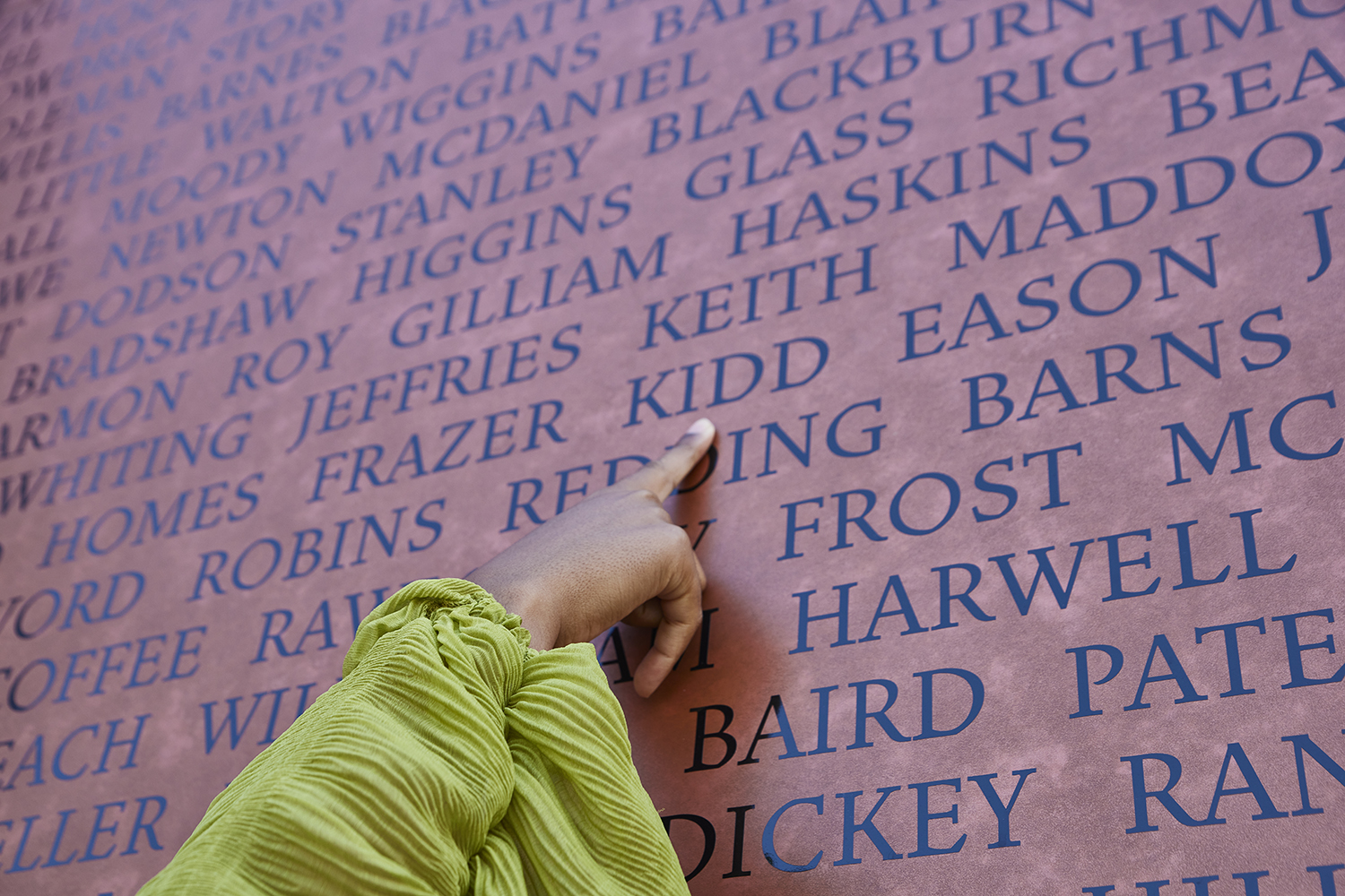 Nya Hardaway identifies her family name on the National Monument to Freedom at Freedom Monument Sculpture Park.