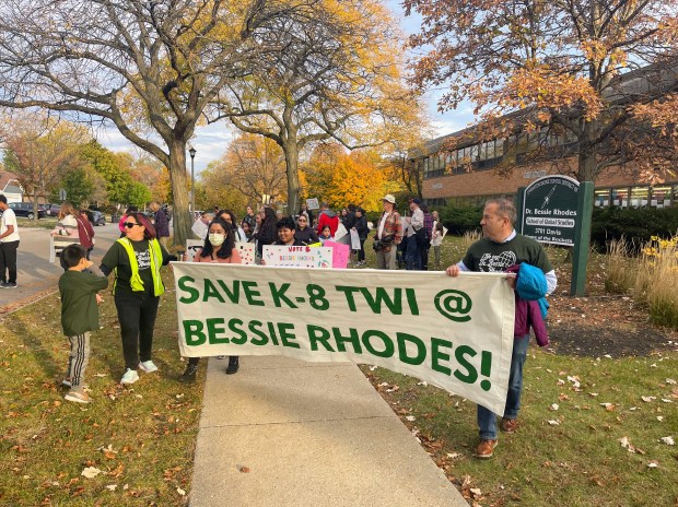 A parent-led protest march took place on Oct. 28 from Dr. Bessie Rhodes School of Global Studies to Joseph E. Hill Early Childhood Center on Oct. 28 before an Evanston/Skokie School District 65 Board of Education meeting. About 100 people participated in the march. (Richard Requena/Pioneer Press)