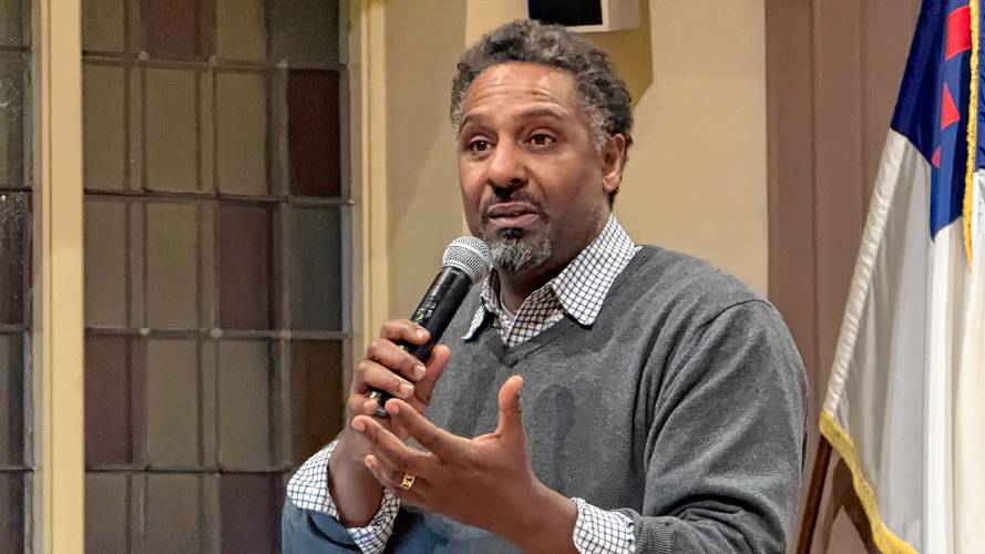 Ousmane Power-Greene, a member of the Northampton Reparations Study Commission, speaks following a film screening at the “Cinematic Chronicles of Race and Resistance” event at Edwards Church in Northampton. 