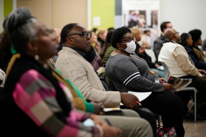 Attendees listen to speakers during the Black Health: A Journey Through Time event at the Healthy Community Center on the Near East Side on Feb. 11, 2025. The program looked at the historical challenges and progress of Black health care.