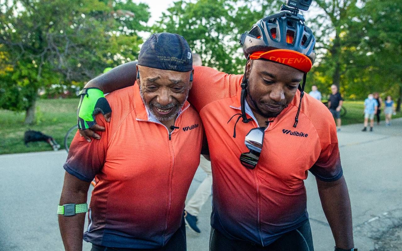 Father and son, Donnie and Eric celebrating the completion of their 350-mile bike trip. Next Avenue, Bike Vessel